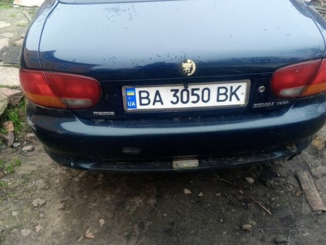 Зелений Мазда Кседос 6, об'ємом двигуна 2 л та пробігом 353 тис. км за 1700 $, фото 2 на Automoto.ua