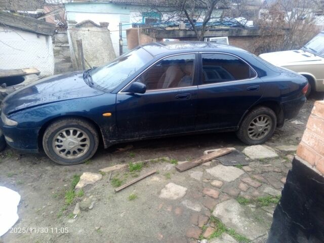 Зелений Мазда Кседос 6, об'ємом двигуна 2 л та пробігом 353 тис. км за 1700 $, фото 1 на Automoto.ua