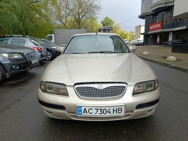 Бежевий Мазда Кседос 9, об'ємом двигуна 2.5 л та пробігом 298 тис. км за 1350 $, фото 2 на Automoto.ua