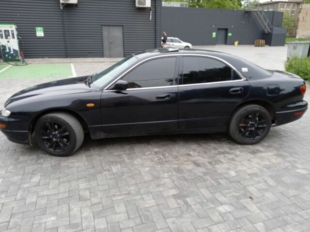 Чорний Мазда Кседос 9, об'ємом двигуна 2 л та пробігом 340 тис. км за 2800 $, фото 3 на Automoto.ua