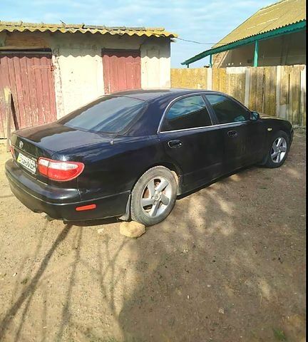 Чорний Мазда Кседос 9, об'ємом двигуна 2.5 л та пробігом 0 тис. км за 2000 $, фото 11 на Automoto.ua