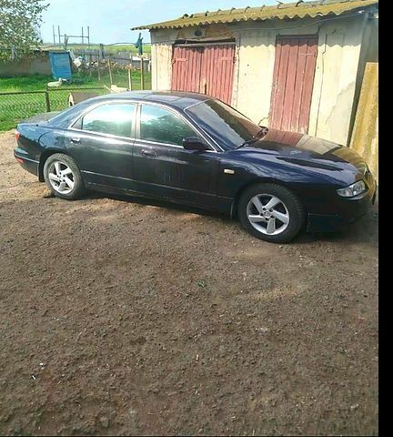 Чорний Мазда Кседос 9, об'ємом двигуна 2.5 л та пробігом 0 тис. км за 2000 $, фото 10 на Automoto.ua