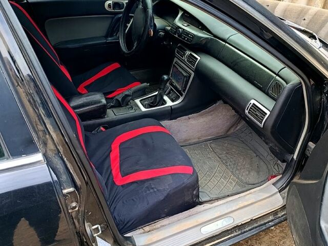 Чорний Мазда Кседос 9, об'ємом двигуна 2.5 л та пробігом 0 тис. км за 2000 $, фото 6 на Automoto.ua