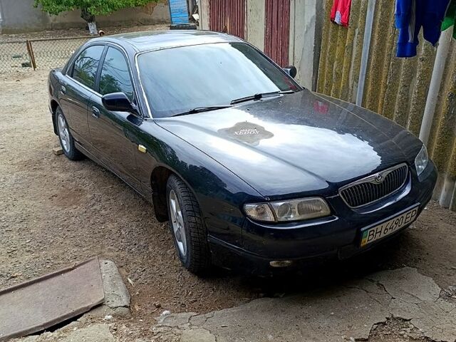 Чорний Мазда Кседос 9, об'ємом двигуна 2.5 л та пробігом 0 тис. км за 2000 $, фото 7 на Automoto.ua