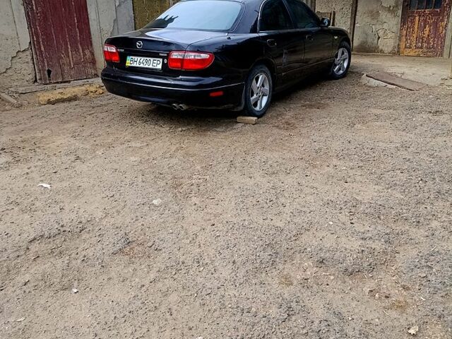 Чорний Мазда Кседос 9, об'ємом двигуна 2.5 л та пробігом 0 тис. км за 2000 $, фото 8 на Automoto.ua
