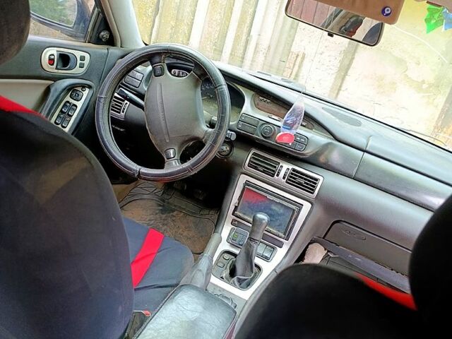 Чорний Мазда Кседос 9, об'ємом двигуна 2.5 л та пробігом 0 тис. км за 2000 $, фото 5 на Automoto.ua