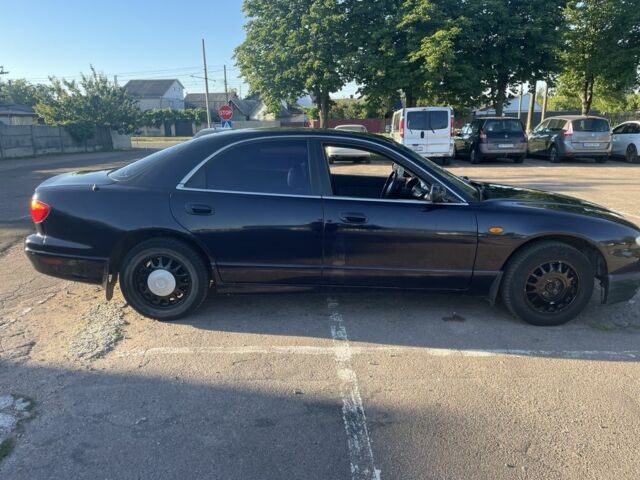 Черный Мазда Кседос 9, объемом двигателя 2 л и пробегом 3 тыс. км за 1800 $, фото 4 на Automoto.ua