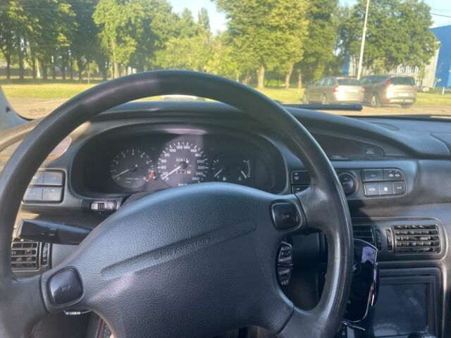 Черный Мазда Кседос 9, объемом двигателя 2 л и пробегом 3 тыс. км за 1800 $, фото 5 на Automoto.ua