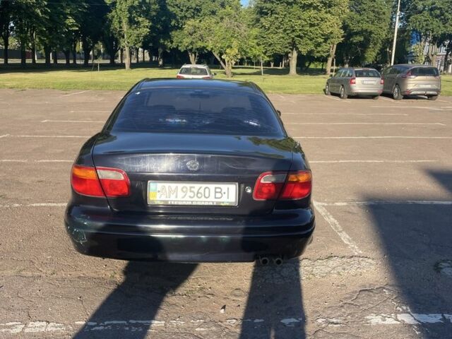 Черный Мазда Кседос 9, объемом двигателя 2 л и пробегом 3 тыс. км за 1800 $, фото 2 на Automoto.ua