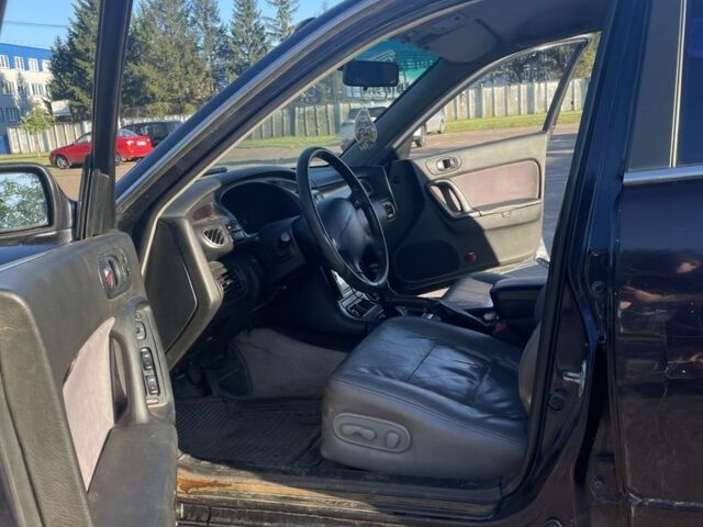 Черный Мазда Кседос 9, объемом двигателя 2 л и пробегом 3 тыс. км за 1800 $, фото 7 на Automoto.ua