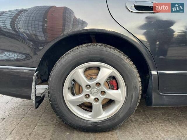 Черный Мазда Кседос 9, объемом двигателя 2 л и пробегом 245 тыс. км за 2000 $, фото 25 на Automoto.ua