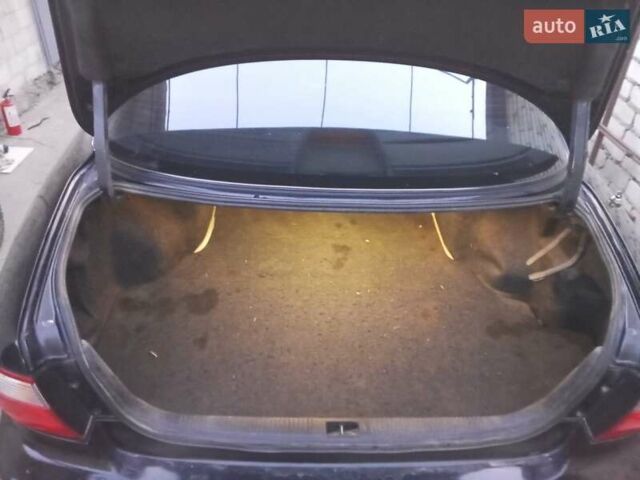 Чорний Мазда Кседос 9, об'ємом двигуна 2.5 л та пробігом 122 тис. км за 3200 $, фото 5 на Automoto.ua