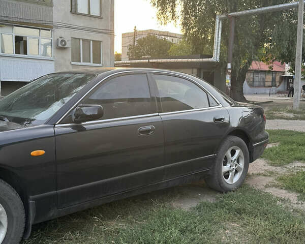 Черный Мазда Кседос 9, объемом двигателя 2.5 л и пробегом 300 тыс. км за 2399 $, фото 8 на Automoto.ua