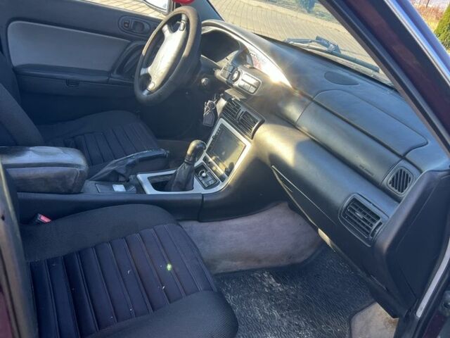 Красный Мазда Кседос 9, объемом двигателя 2.5 л и пробегом 200 тыс. км за 1850 $, фото 5 на Automoto.ua