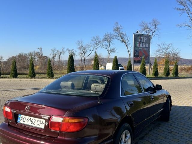 Красный Мазда Кседос 9, объемом двигателя 2.5 л и пробегом 200 тыс. км за 1850 $, фото 7 на Automoto.ua