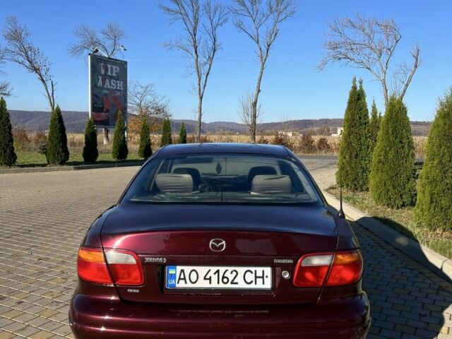 Красный Мазда Кседос 9, объемом двигателя 2.5 л и пробегом 200 тыс. км за 1850 $, фото 3 на Automoto.ua