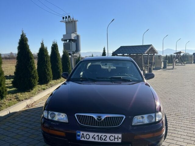 Красный Мазда Кседос 9, объемом двигателя 2.5 л и пробегом 200 тыс. км за 1850 $, фото 1 на Automoto.ua