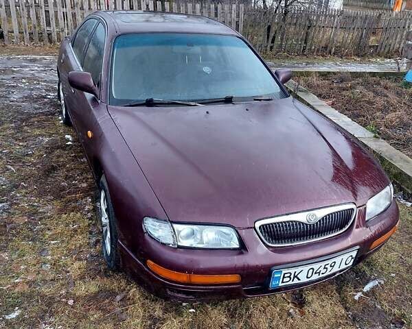 Красный Мазда Кседос 9, объемом двигателя 2 л и пробегом 300 тыс. км за 1100 $, фото 5 на Automoto.ua