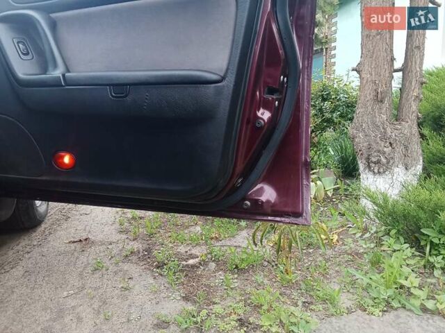Красный Мазда Кседос 9, объемом двигателя 2.5 л и пробегом 170 тыс. км за 2750 $, фото 22 на Automoto.ua