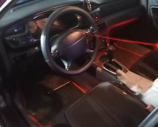 Красный Мазда Кседос 9, объемом двигателя 2.5 л и пробегом 170 тыс. км за 2750 $, фото 11 на Automoto.ua