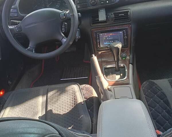 Красный Мазда Кседос 9, объемом двигателя 2.5 л и пробегом 170 тыс. км за 2750 $, фото 1 на Automoto.ua
