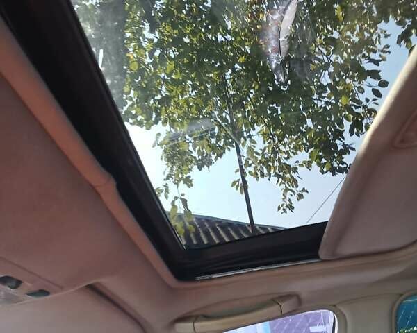 Красный Мазда Кседос 9, объемом двигателя 2.5 л и пробегом 170 тыс. км за 2750 $, фото 8 на Automoto.ua