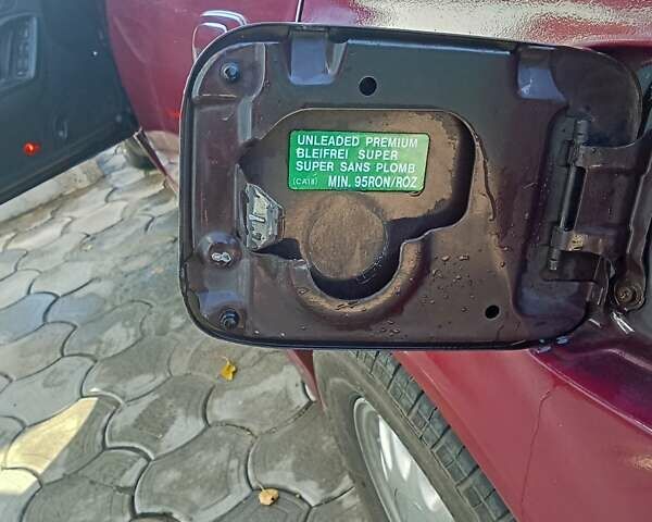 Красный Мазда Кседос 9, объемом двигателя 2.5 л и пробегом 170 тыс. км за 2750 $, фото 5 на Automoto.ua