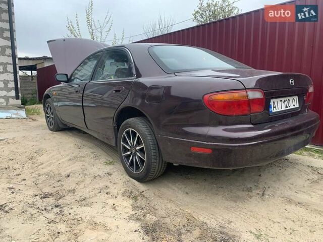 Красный Мазда Кседос 9, объемом двигателя 2 л и пробегом 285 тыс. км за 2000 $, фото 11 на Automoto.ua