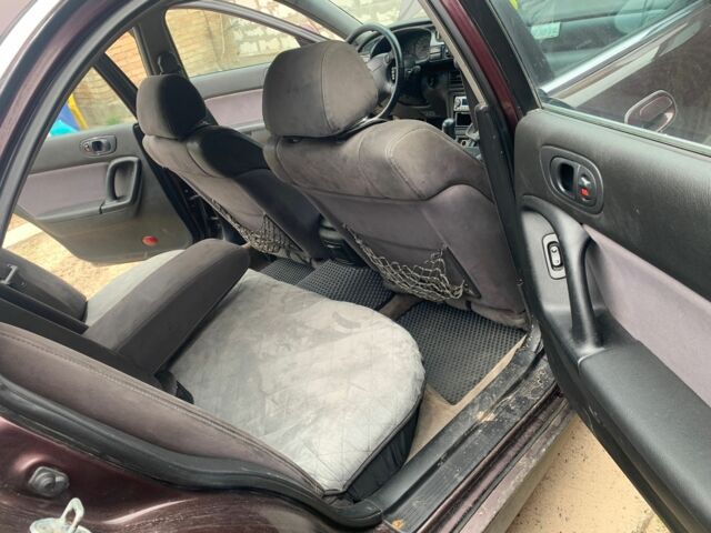 Червоний Мазда Кседос 9, об'ємом двигуна 2 л та пробігом 285 тис. км за 2000 $, фото 2 на Automoto.ua