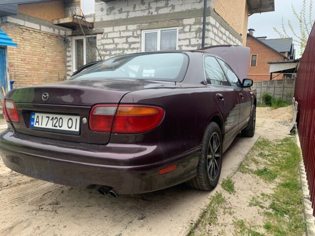 Червоний Мазда Кседос 9, об'ємом двигуна 2 л та пробігом 285 тис. км за 2000 $, фото 1 на Automoto.ua