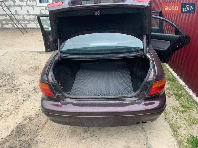 Красный Мазда Кседос 9, объемом двигателя 2 л и пробегом 285 тыс. км за 2000 $, фото 10 на Automoto.ua