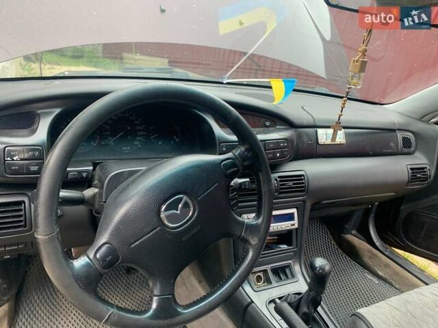 Красный Мазда Кседос 9, объемом двигателя 2 л и пробегом 285 тыс. км за 2000 $, фото 5 на Automoto.ua