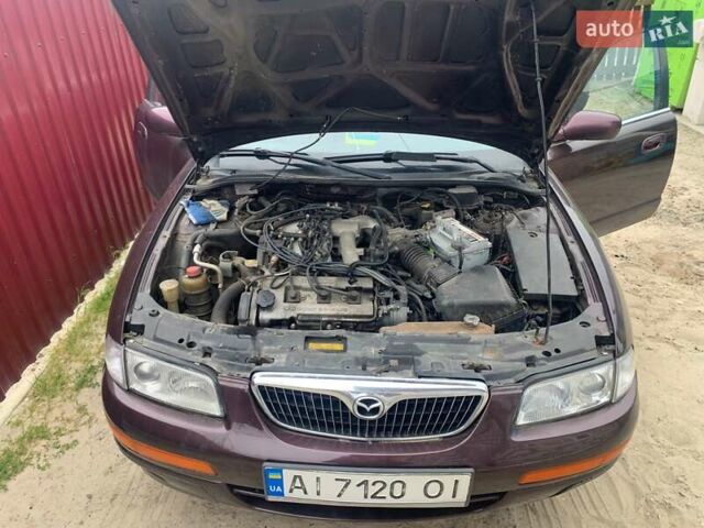 Красный Мазда Кседос 9, объемом двигателя 2 л и пробегом 285 тыс. км за 2000 $, фото 3 на Automoto.ua