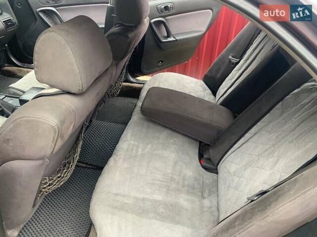 Красный Мазда Кседос 9, объемом двигателя 2 л и пробегом 285 тыс. км за 2000 $, фото 7 на Automoto.ua