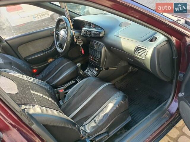 Красный Мазда Кседос 9, объемом двигателя 2 л и пробегом 240 тыс. км за 2050 $, фото 12 на Automoto.ua