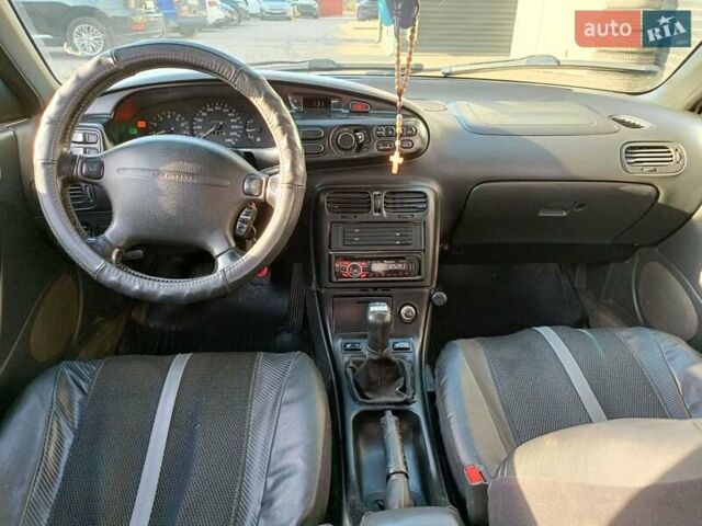 Красный Мазда Кседос 9, объемом двигателя 2 л и пробегом 240 тыс. км за 2050 $, фото 11 на Automoto.ua