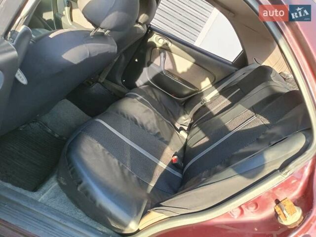 Красный Мазда Кседос 9, объемом двигателя 2 л и пробегом 240 тыс. км за 2050 $, фото 17 на Automoto.ua