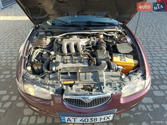 Красный Мазда Кседос 9, объемом двигателя 2 л и пробегом 240 тыс. км за 2050 $, фото 9 на Automoto.ua