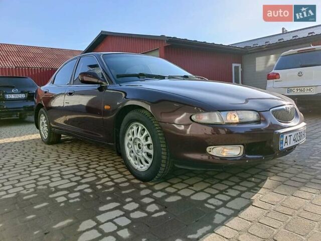 Красный Мазда Кседос 9, объемом двигателя 2 л и пробегом 240 тыс. км за 2050 $, фото 7 на Automoto.ua