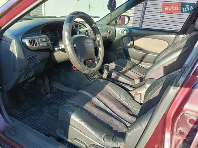 Красный Мазда Кседос 9, объемом двигателя 2 л и пробегом 240 тыс. км за 2050 $, фото 19 на Automoto.ua