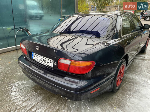 Мазда Кседос 9, объемом двигателя 2.5 л и пробегом 400 тыс. км за 2650 $, фото 2 на Automoto.ua