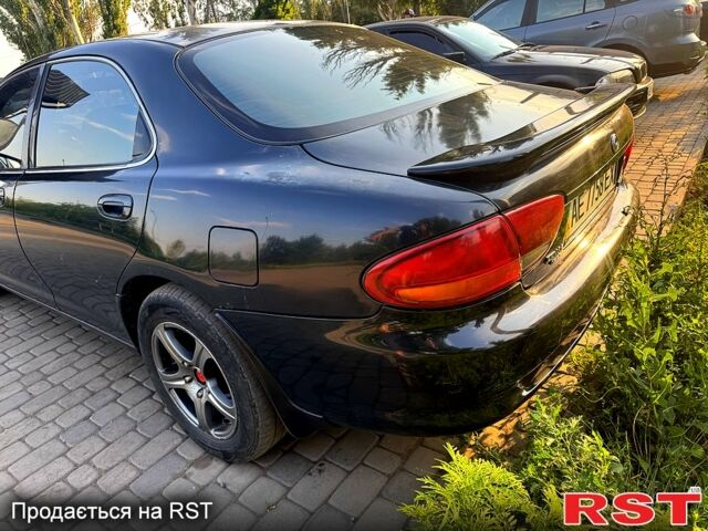Мазда Кседос 9, объемом двигателя 2 л и пробегом 320 тыс. км за 1999 $, фото 5 на Automoto.ua