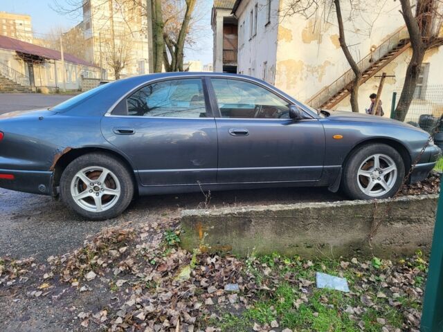 Серый Мазда Кседос 9, объемом двигателя 2.5 л и пробегом 240 тыс. км за 1100 $, фото 7 на Automoto.ua