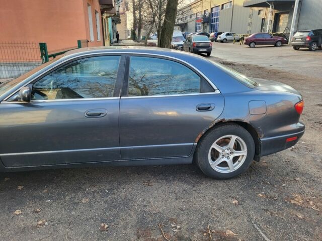 Серый Мазда Кседос 9, объемом двигателя 2.5 л и пробегом 240 тыс. км за 1100 $, фото 6 на Automoto.ua