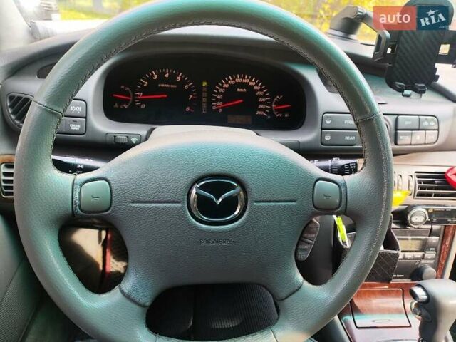 Серый Мазда Кседос 9, объемом двигателя 2.5 л и пробегом 274 тыс. км за 2700 $, фото 5 на Automoto.ua