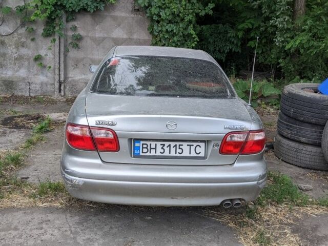 Серый Мазда Кседос 9, объемом двигателя 2 л и пробегом 200 тыс. км за 967 $, фото 2 на Automoto.ua