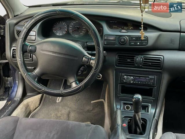 Синій Мазда Кседос 9, об'ємом двигуна 2 л та пробігом 405 тис. км за 1600 $, фото 14 на Automoto.ua