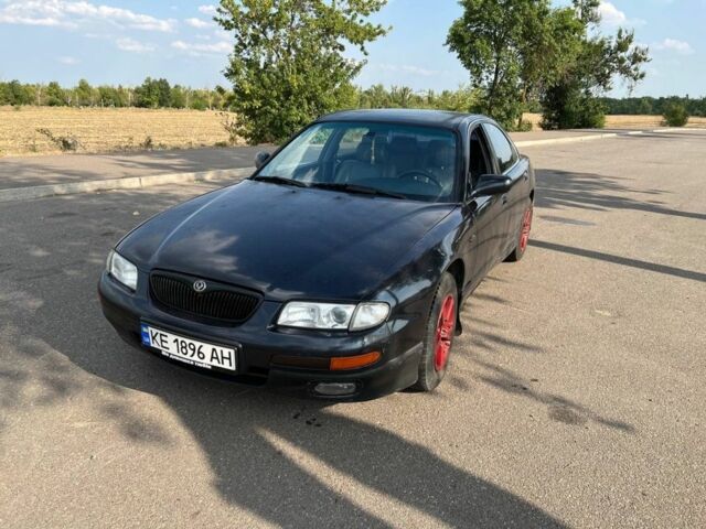 Синий Мазда Кседос 9, объемом двигателя 2.5 л и пробегом 420 тыс. км за 1800 $, фото 5 на Automoto.ua