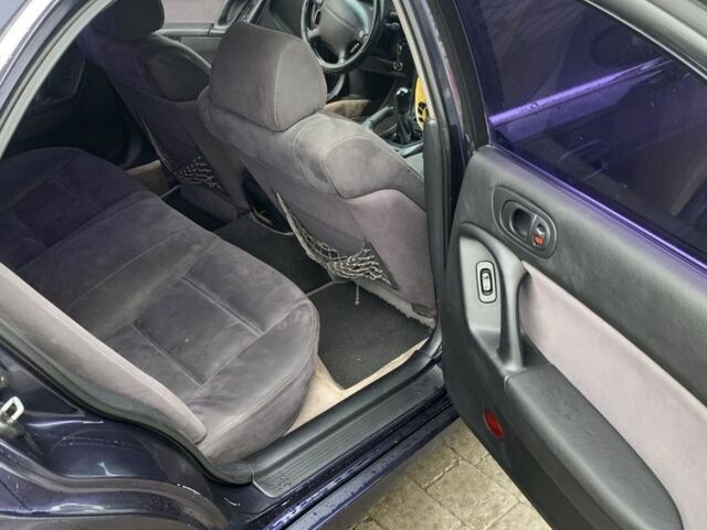 Синий Мазда Кседос 9, объемом двигателя 2 л и пробегом 407 тыс. км за 1950 $, фото 5 на Automoto.ua