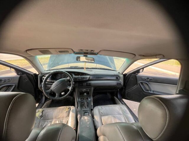 Синий Мазда Кседос 9, объемом двигателя 2.5 л и пробегом 420 тыс. км за 1800 $, фото 6 на Automoto.ua